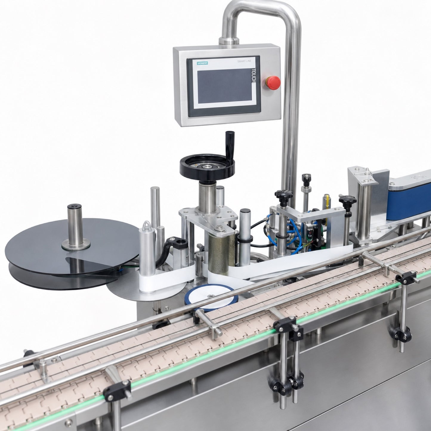 
                  
                    Leadlife LLA-A3 labeling machine label reel and applicator above the bottle conveyor
                  
                