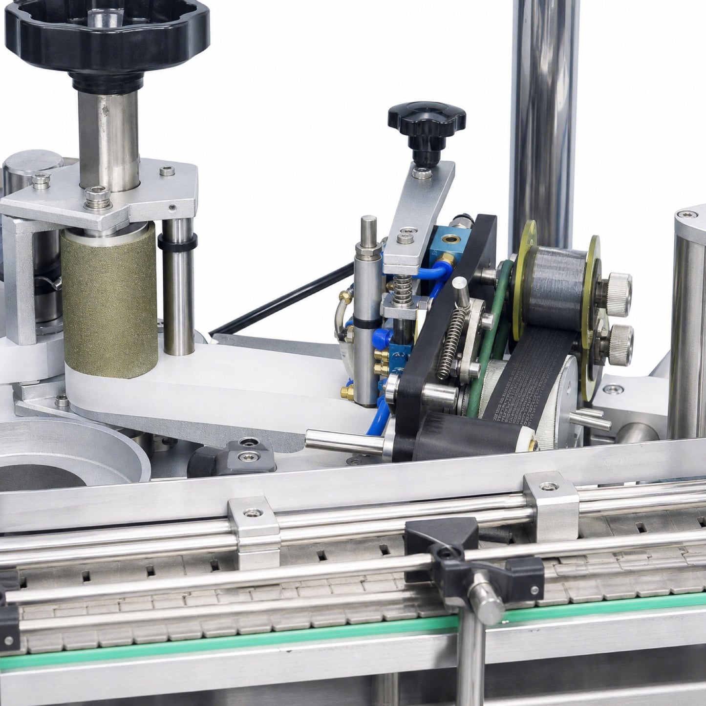 
                  
                    Leadlife LLA-A3 labeling machine applicator and belt drive detail
                  
                