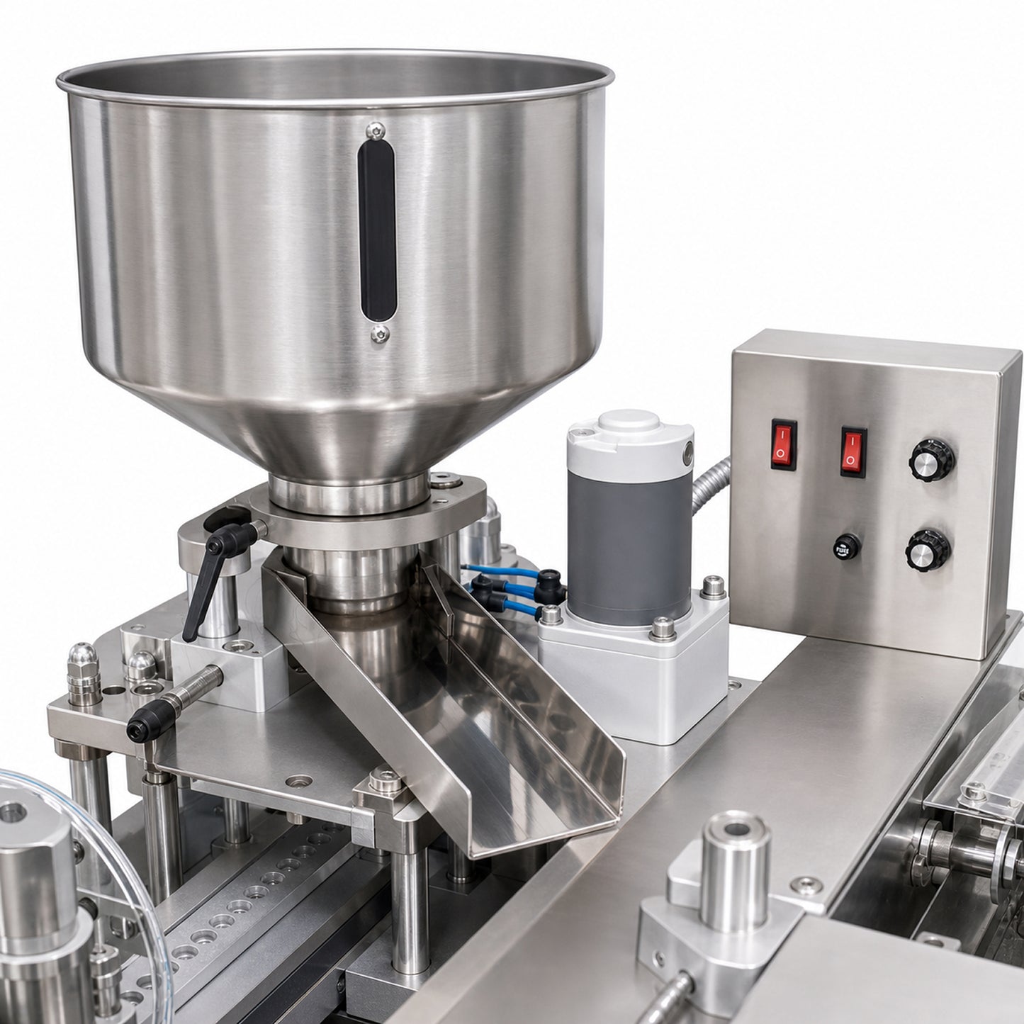 
                  
                    Product feed hopper and controls on the high speed blister packing machine
                  
                