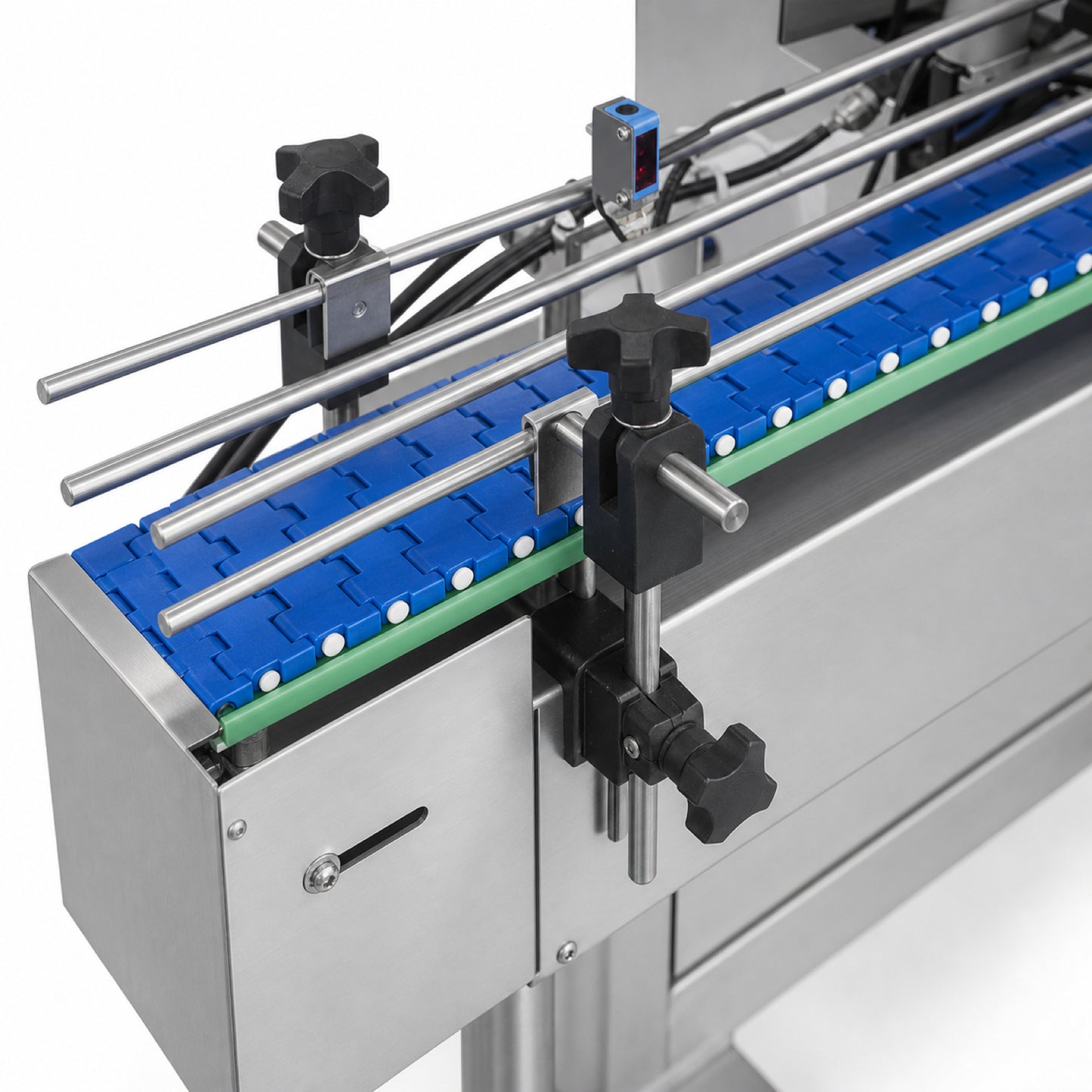 
                  
                    Automatic cotton inserter for bottling lines — close-up view
                  
                